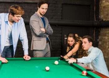 What is the difference between a pool table and a billiard table?