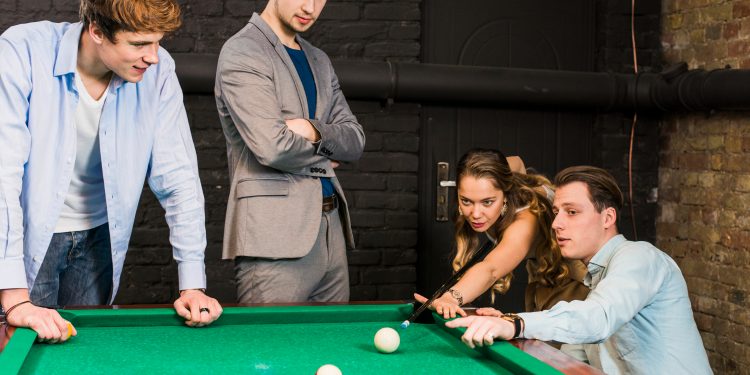 What is the difference between a pool table and a billiard table?